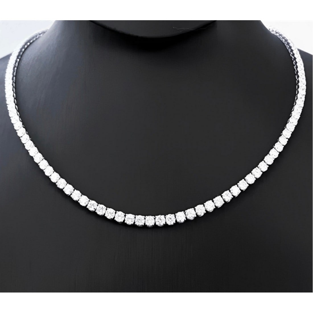 18kt White Gold 28.98ct. Round cut Diamond Necklace: Gold Content: 18kt White Gold Gold weight (gm): 33.79 Shape of Lab Diamonds: Round Number of Lab Diamonds: 97 Lab Diamond Carat Range: 0.29 - 0.30 Lab Diamond Color Range: D - F Lab Diamond Clari