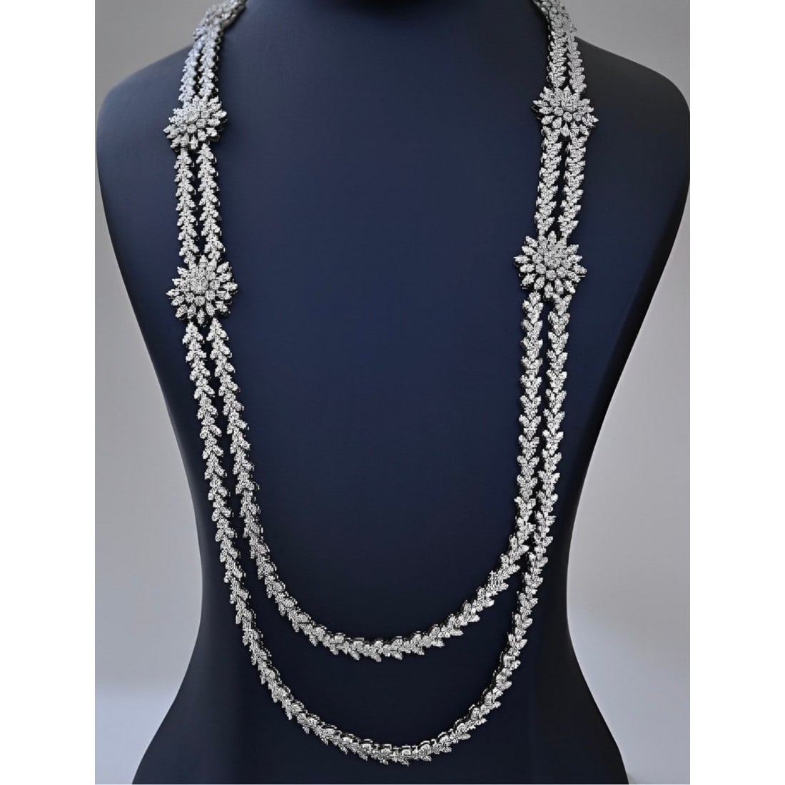 18kt White Gold 24.30ct. Round cut Diamond Necklace: Gold Content: 18kt White Gold Gold weight (gm): 81.14 Shape of Lab Diamonds: Round Number of Lab Diamonds: 1851 Lab Diamond Carat Range: 0.004 - 0.04 Lab Diamond Color Range: D - F Lab Diamond Cl