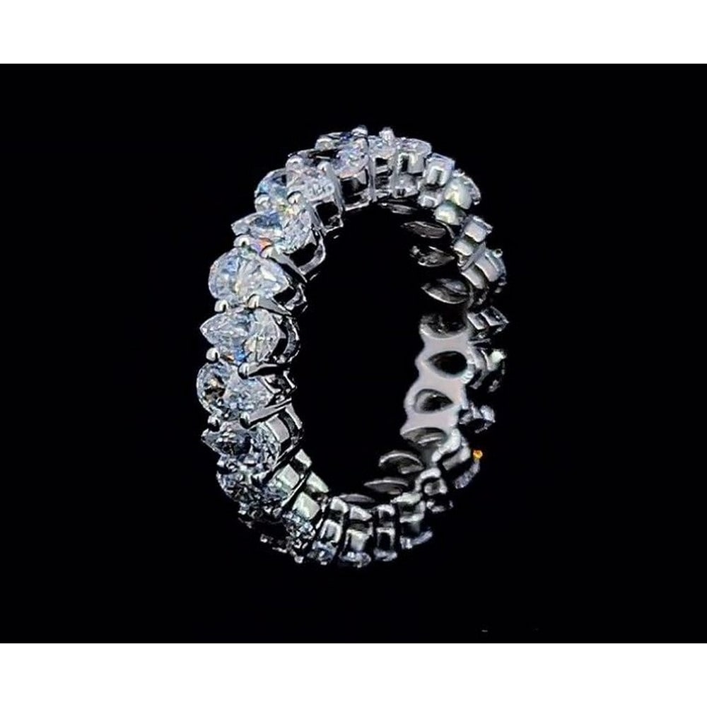 14kt White Gold 7.59 ct Pear Cut Diamond Eternity Band: All Diamonds are lab grown and IGI graded, and comes with IGI certificate for each Diamond Ring Size (US) : Sizeable from 5 - 9 Diamond cut Shape: Pear Diamond size and carat range: 0.50-0.55