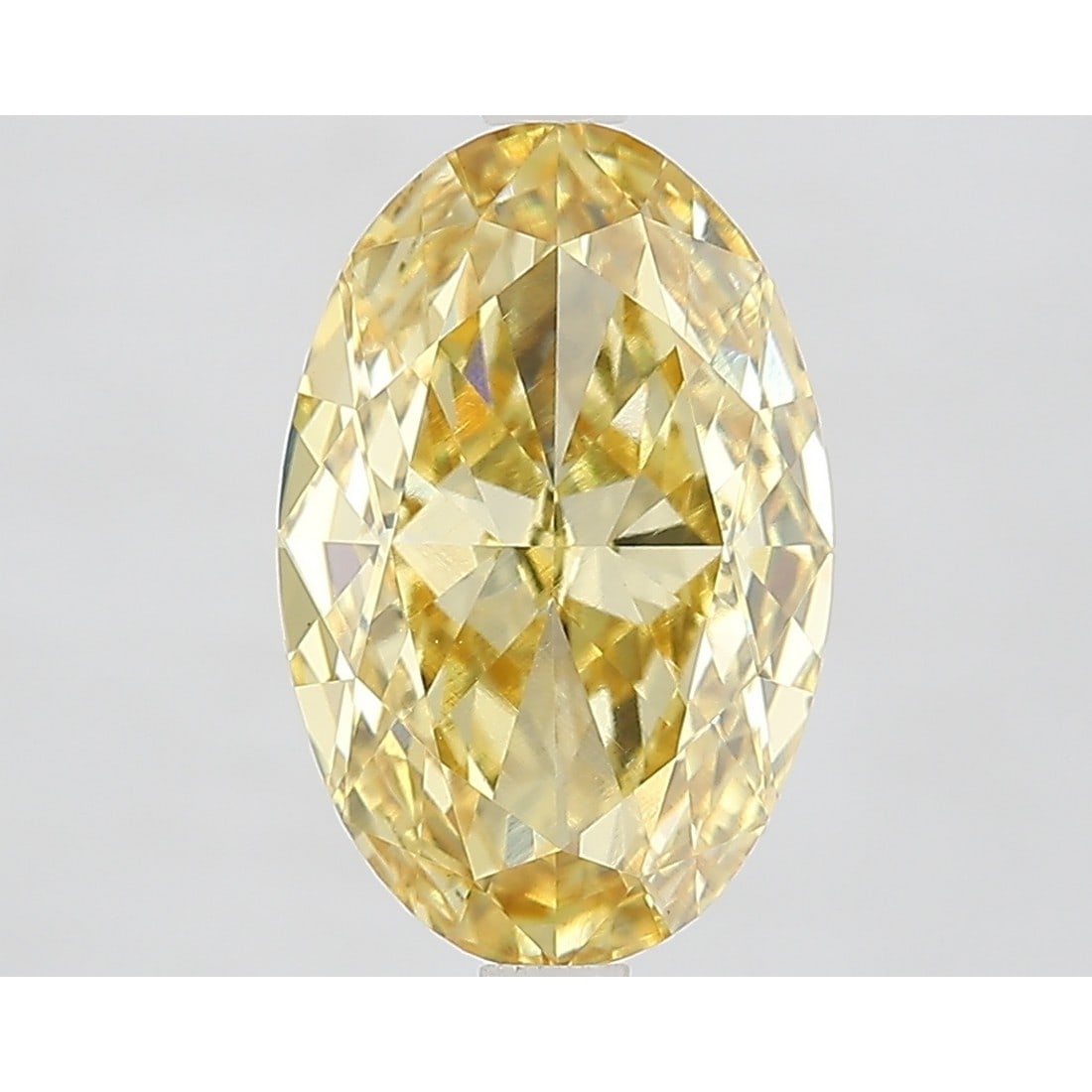3.90 ct, Fancy Vivid Yellow/VVS2, Oval cut IGI Graded Diamond: Click here to view HD 360 Spinning Image Click here to view Certificate Report IGI Gra