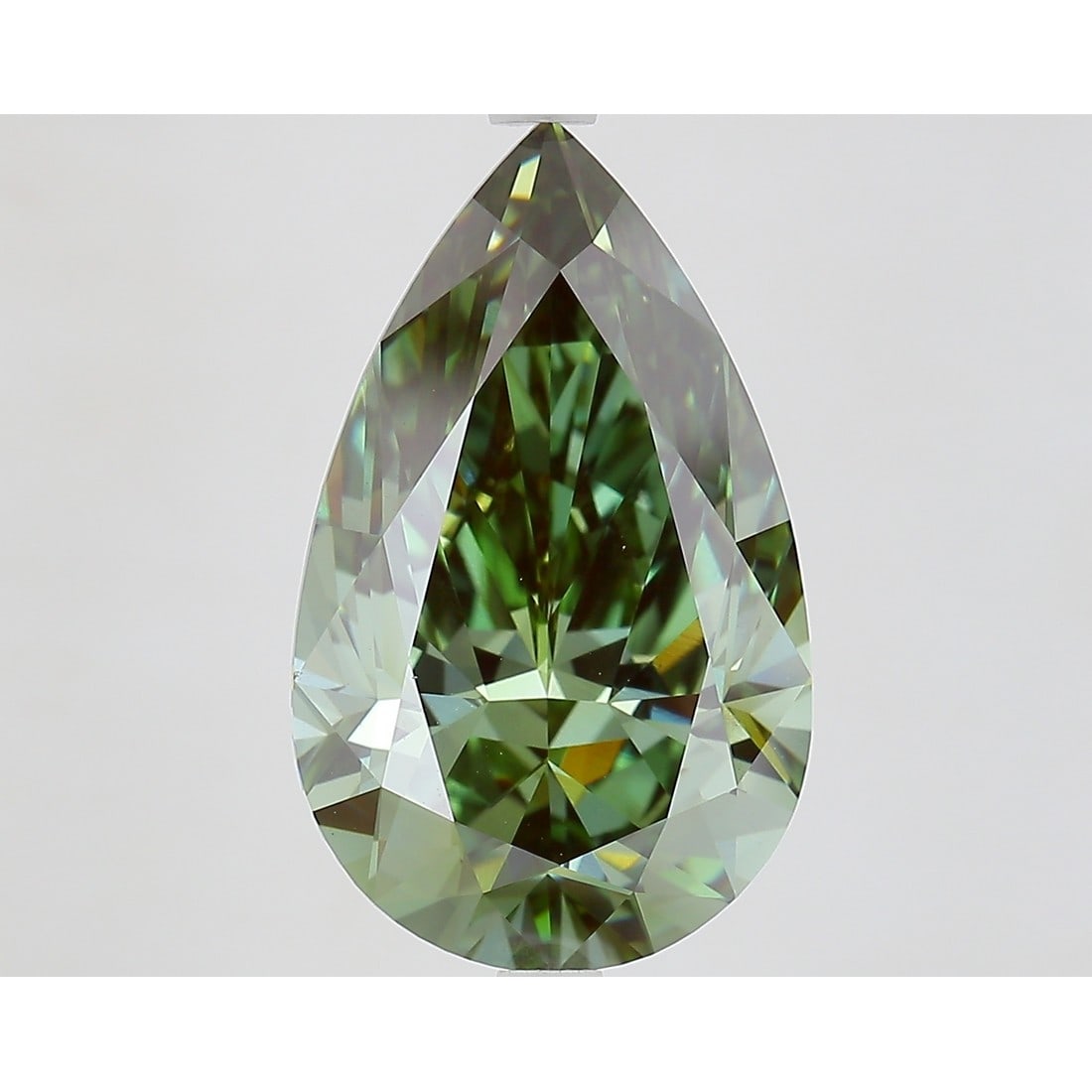 7.01 ct, Fancy Vivid Green/VVS2, Pear cut IGI Graded Diamond: Click here to view HD 360 Spinning Image Click here to view Certificate Report IGI Graded S