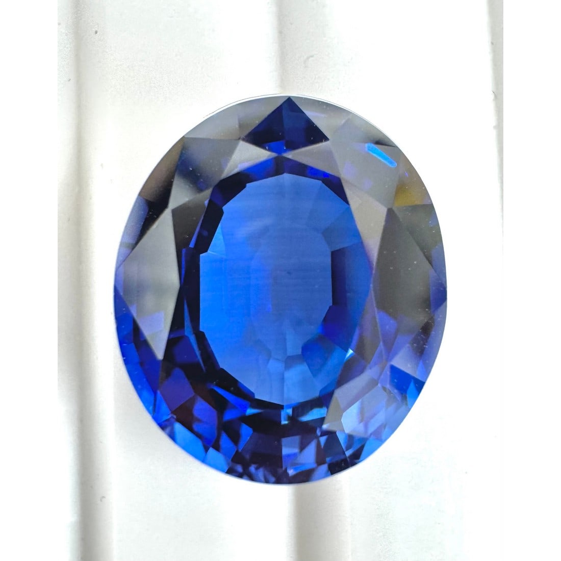 14.22 ct. (IGI) Oval Mixed Cut Lab Grown Blue Sapphire (1 of 3)