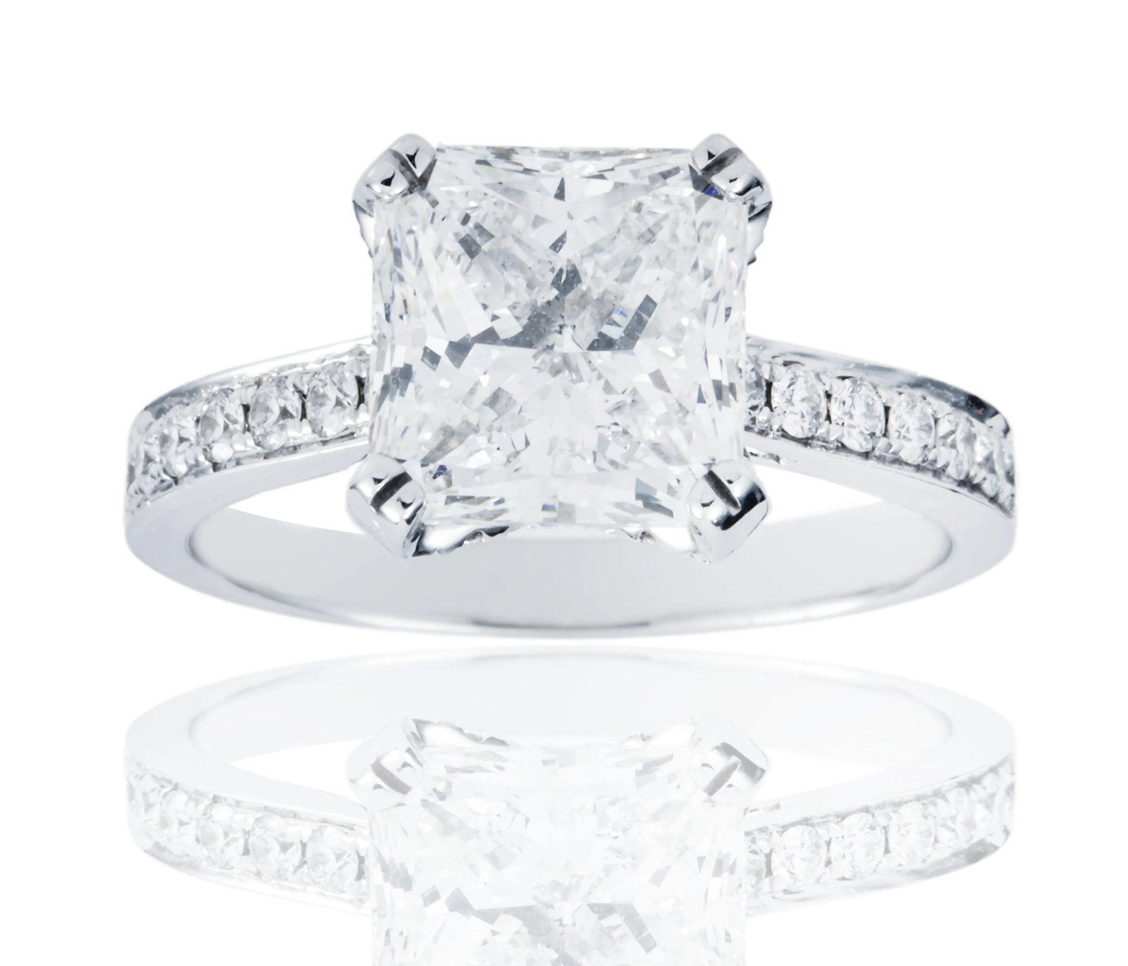 18 kt White Gold 3.5tcw Cushion Cut Engagement Ring: Gold Type: 18 kt White Gold Gold weight (gram): 8 Total Carat Weight of Lab Grown Diamonds (Approximate): 3.5 Total # of Lab Grown Diamonds: 63 Shape of Lab Grown Diamonds: Cushion/ Round La