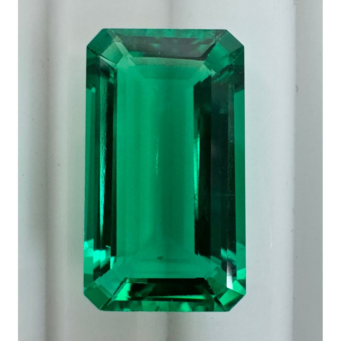13.14 ct. (IGI) Emerald Cut Lab Grown Columbian Emerald: Click here to view Certificate Report IGI Graded Gemstone Type: Columbian Emerald (Lab Grown) Cut Shape: Emerald Measurement (Appro.