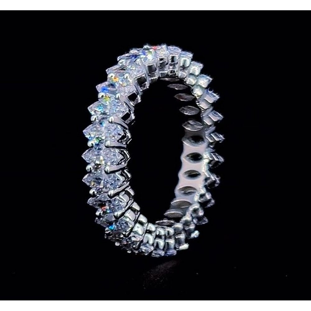 14kt White Gold 7.55 ct Marquise Cut Diamond Eternity Band: All Diamonds are lab grown and IGI graded, and comes with IGI certificate for each Diamond Ring Size (US) : Sizeable from 5 - 9 Diamond cut Shape: Marquise Diamond size and carat range: 0.50-0.5