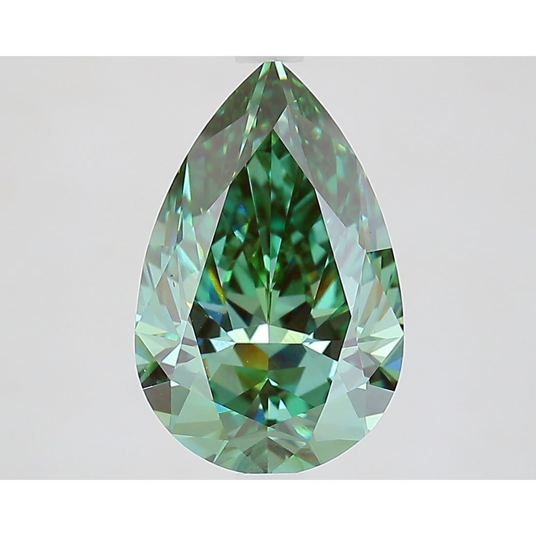 3.51 ct, Fancy Vivid Green/VVS2, Pear cut IGI Graded Diamond: Click here to view HD 360 Spinning Image Click here to view Certificate Report IGI Graded S