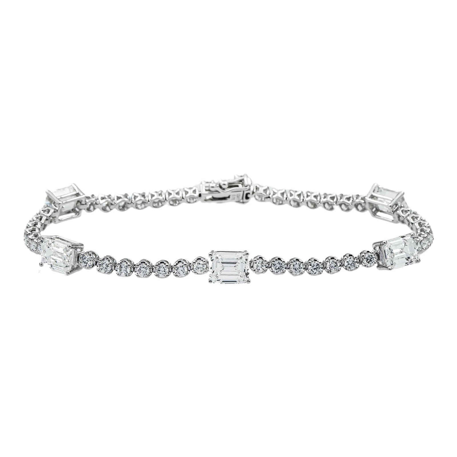 14kt White Gold 6.81tcw Fancy Diamond Bracelet: Gold Type: 14 kt White Gold Gold weight (gram): 12 Total Carat Weight of Lab Grown Diamonds (Approximate): 6.81 Total # of Lab Grown Diamonds: 47 Shape of Lab Grown Diamonds: Round/ Emerald