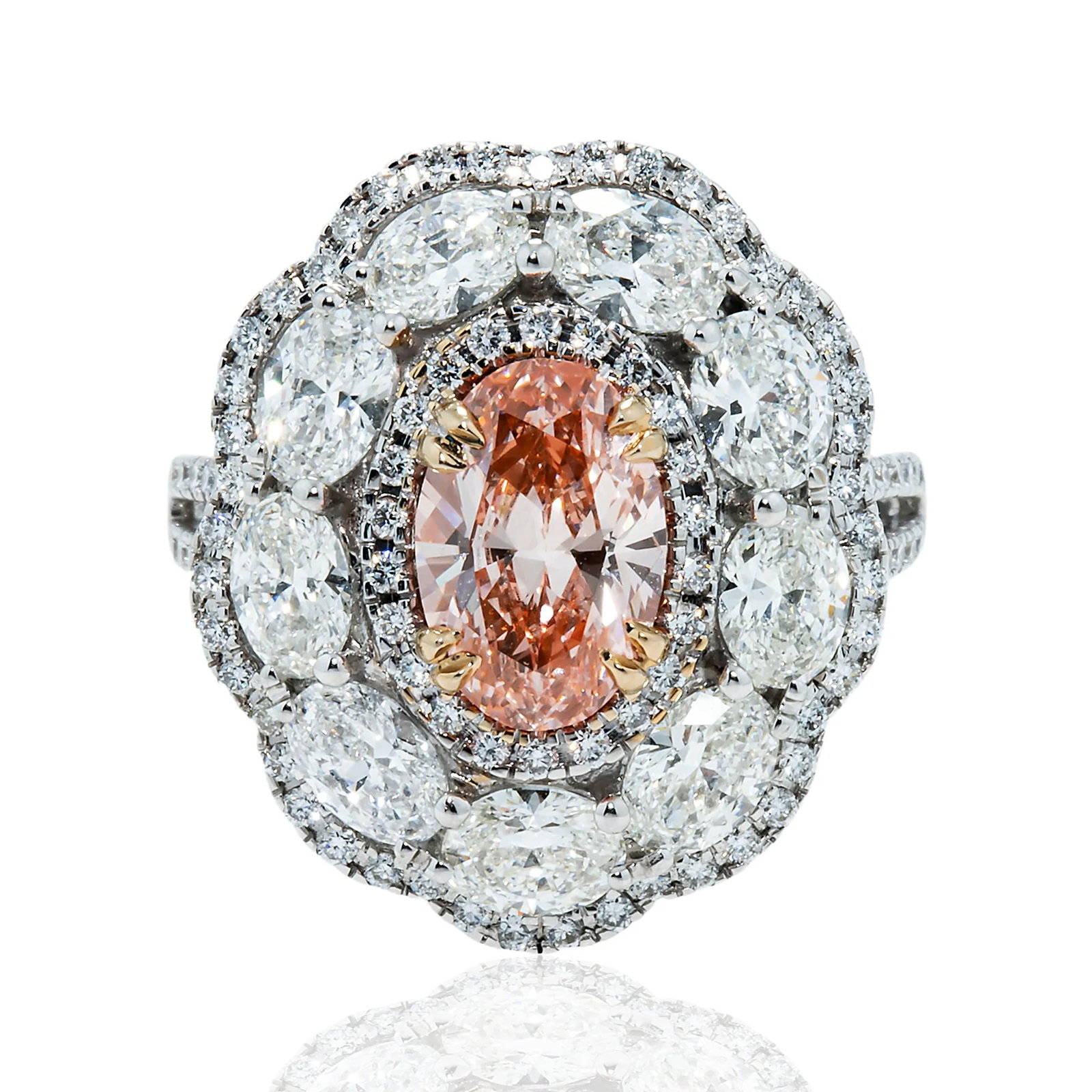18 kt White Gold 5.75tcw Fancy Intense Pink Oval Diamond Halo Ring: Gold Type: 18 kt White Gold Gold weight (gram): 10 Total Carat Weight of Lab Grown Diamonds (Approximate): 5.75 Total # of Lab Grown Diamonds: 177 Shape of Lab Grown Diamonds: Oval/ Round La
