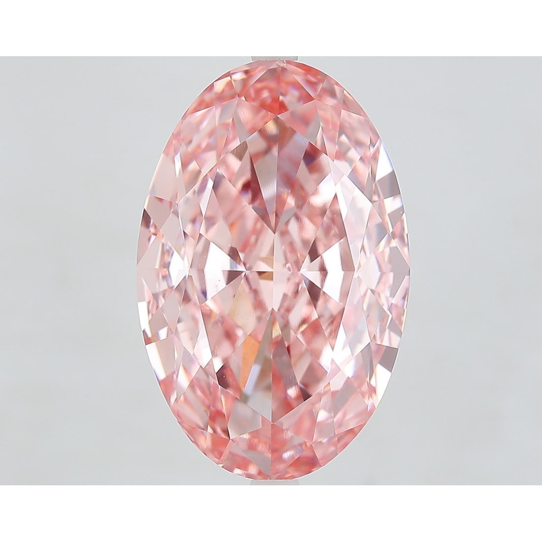 13.87 ct, Fancy Vivid Pink/VVS2, Oval cut IGI Graded Diamond: Click here to view HD 360 Spinning Image Click here to view Certificate Report IGI Gra