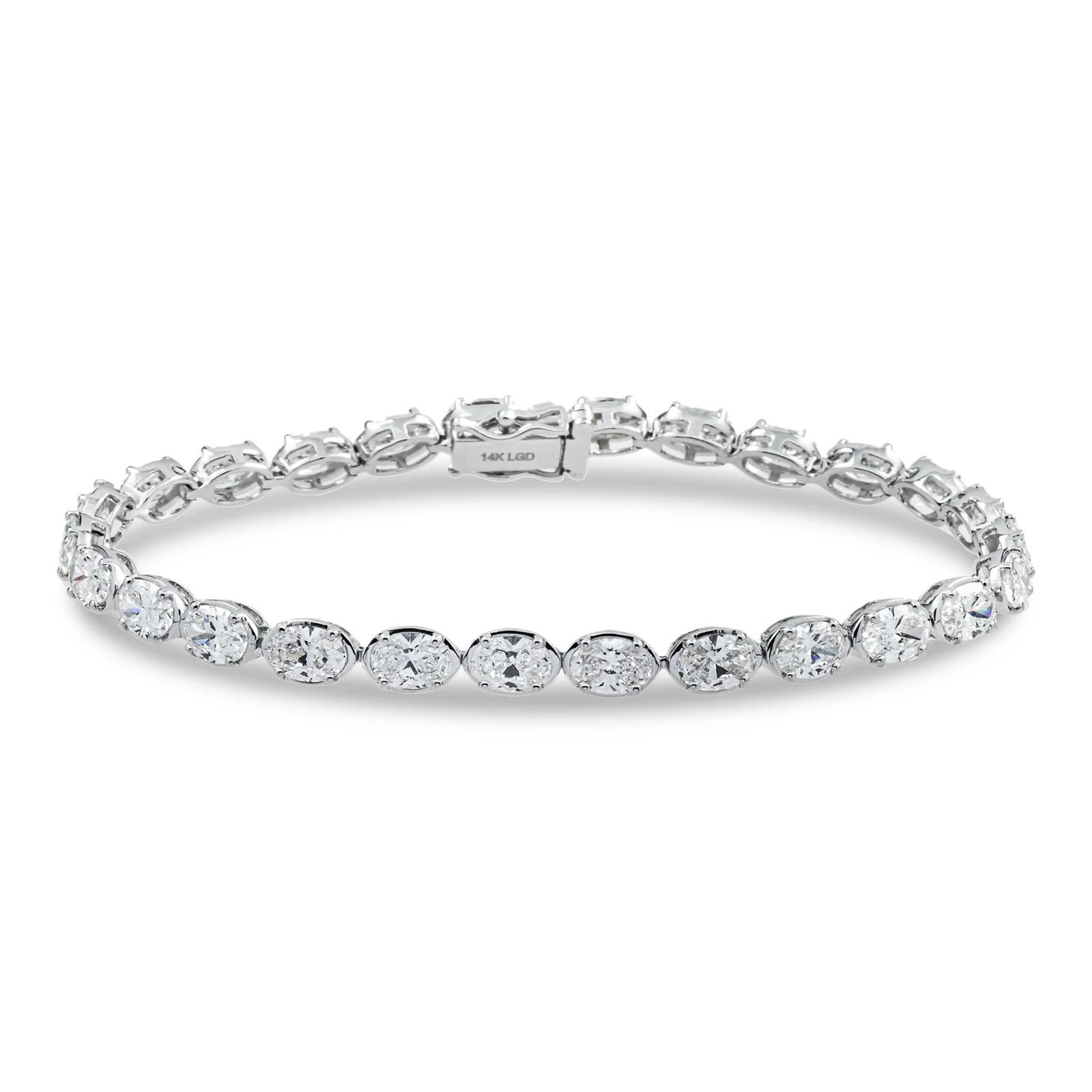 14kt White Gold 8.54tcw Bezel Set Oval Diamond Tennis Bracelet: Gold Type: 14 kt White Gold Gold weight (gram): 14.5 Total Carat Weight of Lab Grown Diamonds (Approximate): 8.54 Total # of Lab Grown Diamonds: 27 Shape of Lab Grown Diamonds: Oval Lab Grow