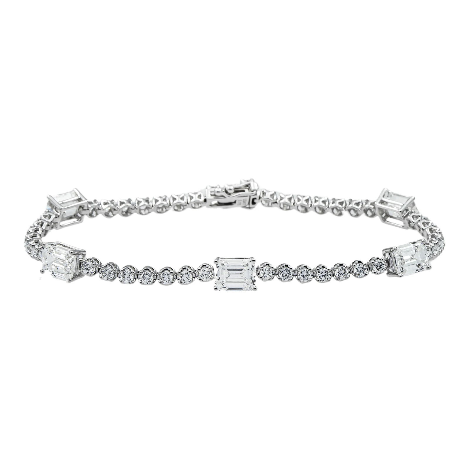 14kt White Gold 6.81tcw Fancy Diamond Bracelet: Gold Type: 14 kt White Gold Gold weight (gram): 12 Total Carat Weight of Lab Grown Diamonds (Approximate): 6.81 Total # of Lab Grown Diamonds: 47 Shape of Lab Grown Diamonds: Round/ Emerald