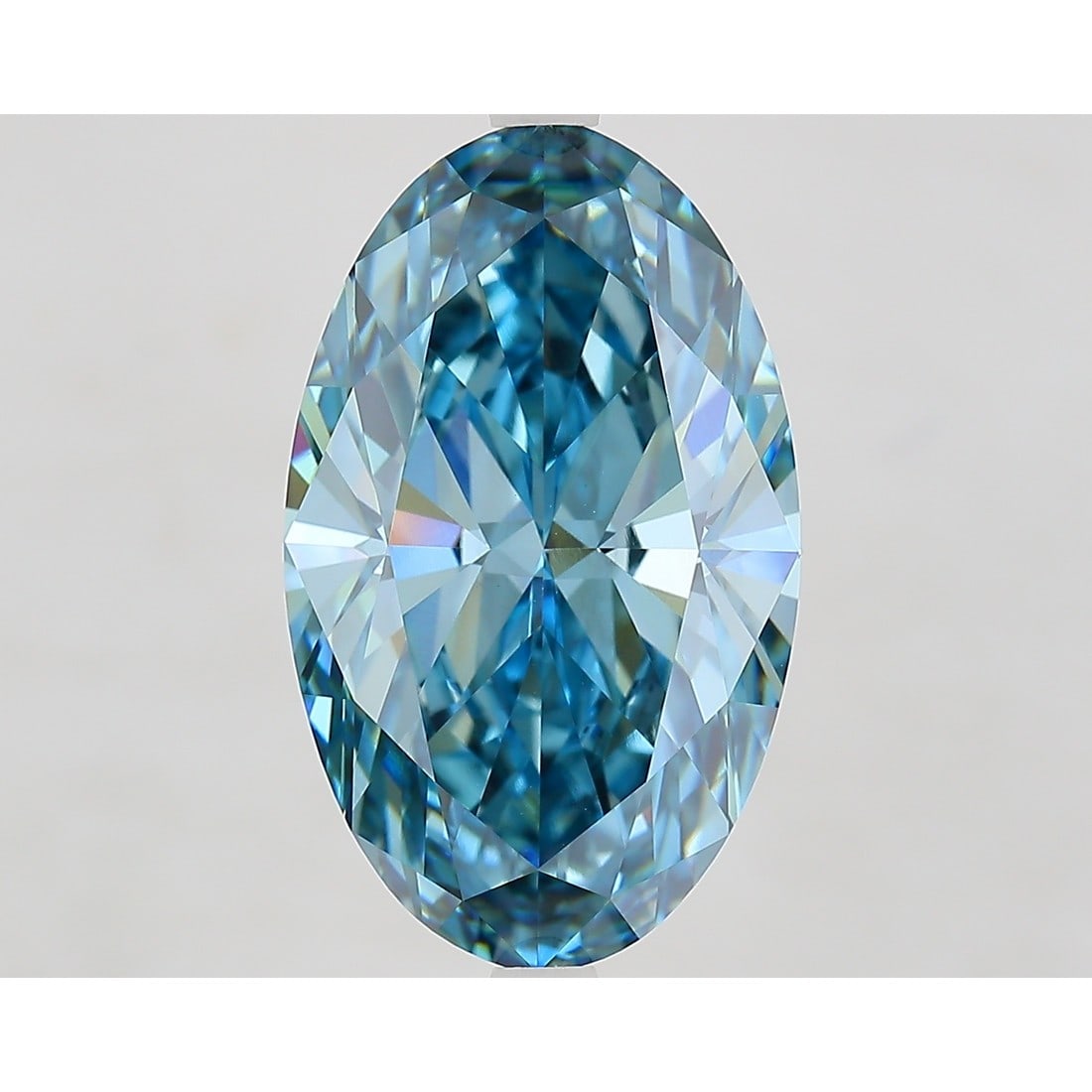 7.59 ct, Fancy Vivid Greenish Blue/VS1, Oval cut IGI Graded Diamond: Click here to view HD 360 Spinning Image Click here to view Certificate Report IGI Gra