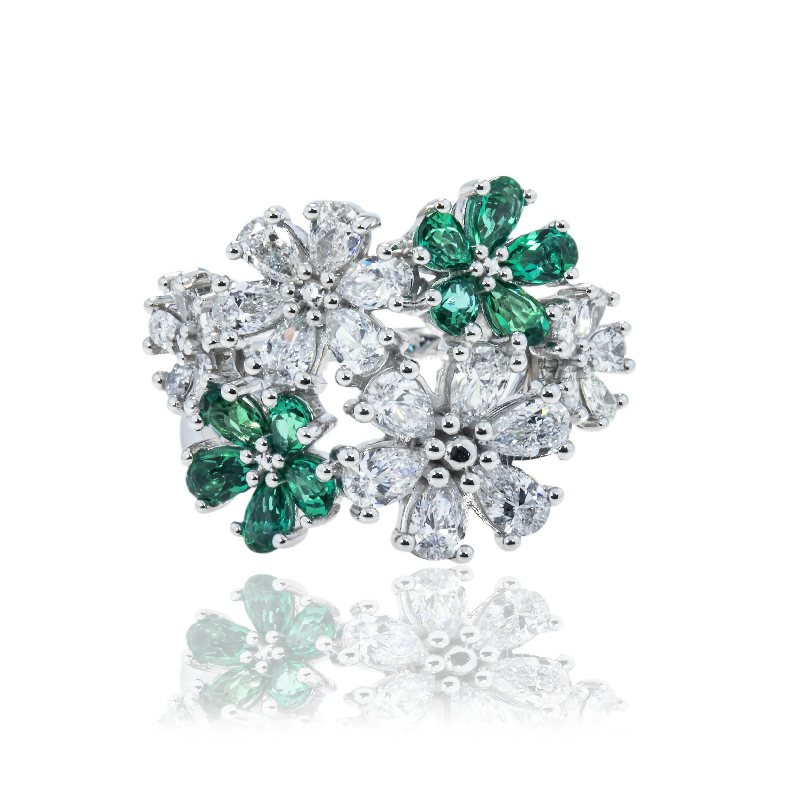 18kt White Gold 3.2tcw Emerald And Diamond Spring Flower Ring: Gold Type: 18kt White Gold Gold weight (gram): 12 Total Carat Weight of Lab Grown Diamonds (Approximate): 3.2 Total # of Lab Grown Diamonds: 22 Shape of Lab Grown Diamonds: Pear Lab Grown Di