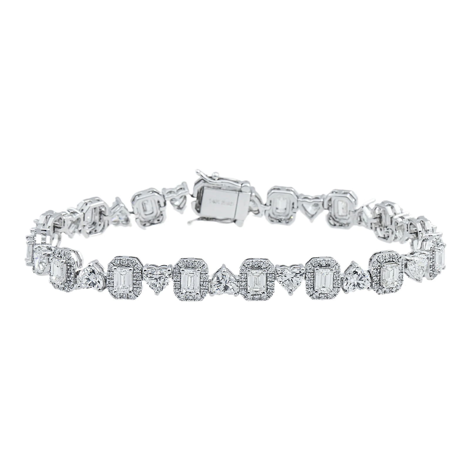14kt White Gold 11.25tcw Heart And Emerald Cut Diamond Bracelet: Gold Type: 14 kt White Gold Gold weight (gram): 17 Total Carat Weight of Lab Grown Diamonds (Approximate): 11.25 Total # of Lab Grown Diamonds: 256 Shape of Lab Grown Diamonds: Emerald/ Round/