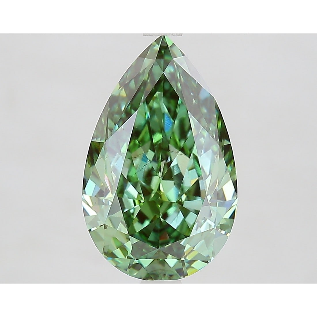 4.11 ct, Fancy Vivid Green/VS2, Pear cut IGI Graded Diamond: Click here to view HD 360 Spinning Image Click here to view Certificate Report IGI Gra