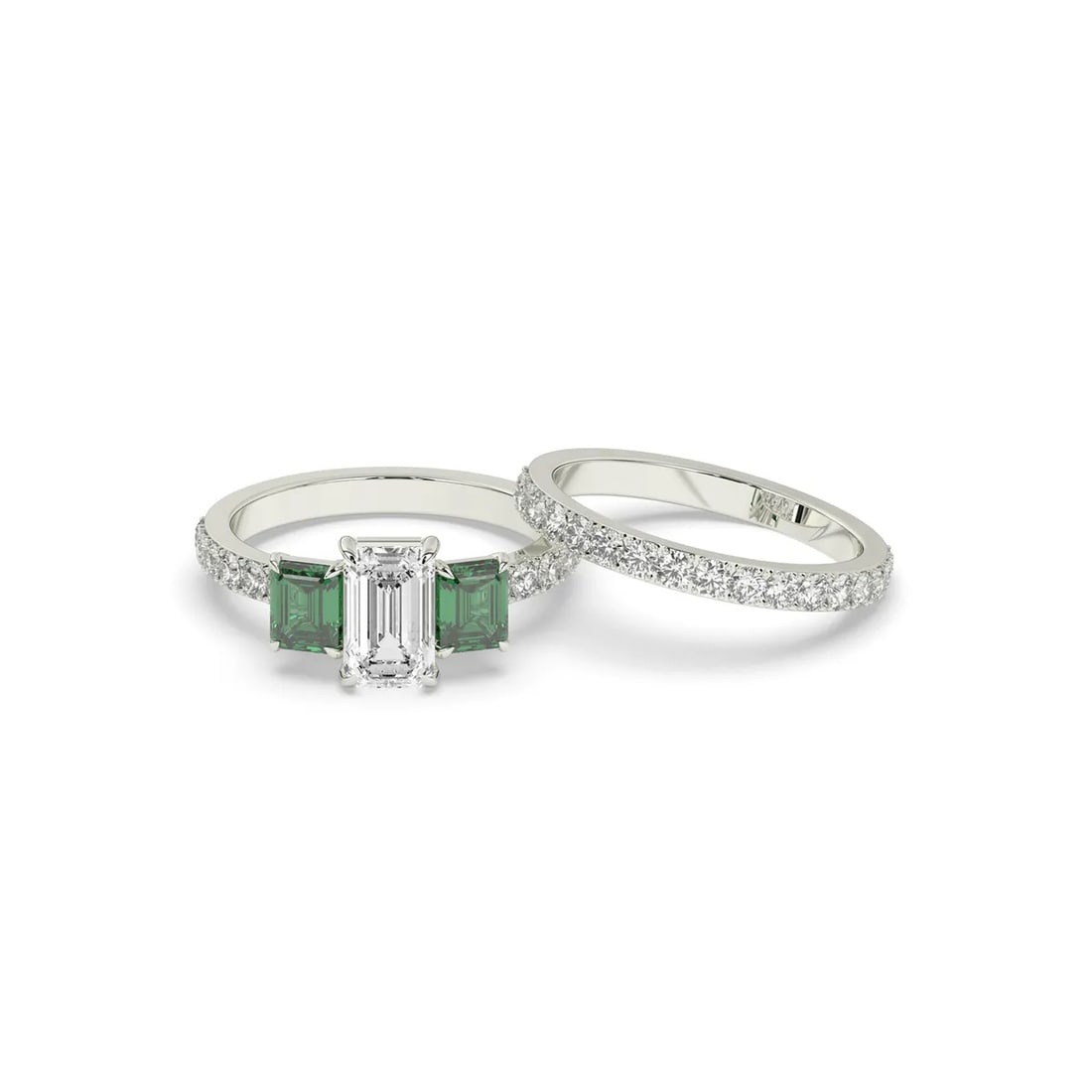 Platinum 3.5tcw Emerald cut Diamond and Green Emeralds Flush Fit Band Set: Gold Type: Platinum Gold weight (gram): 6 Total Carat Weight of Lab Grown Diamonds (Approximate): 3.5 Total # of Lab Grown Diamonds: 30 Shape of Lab Grown Diamonds: Emerald/Round Lab Grown D