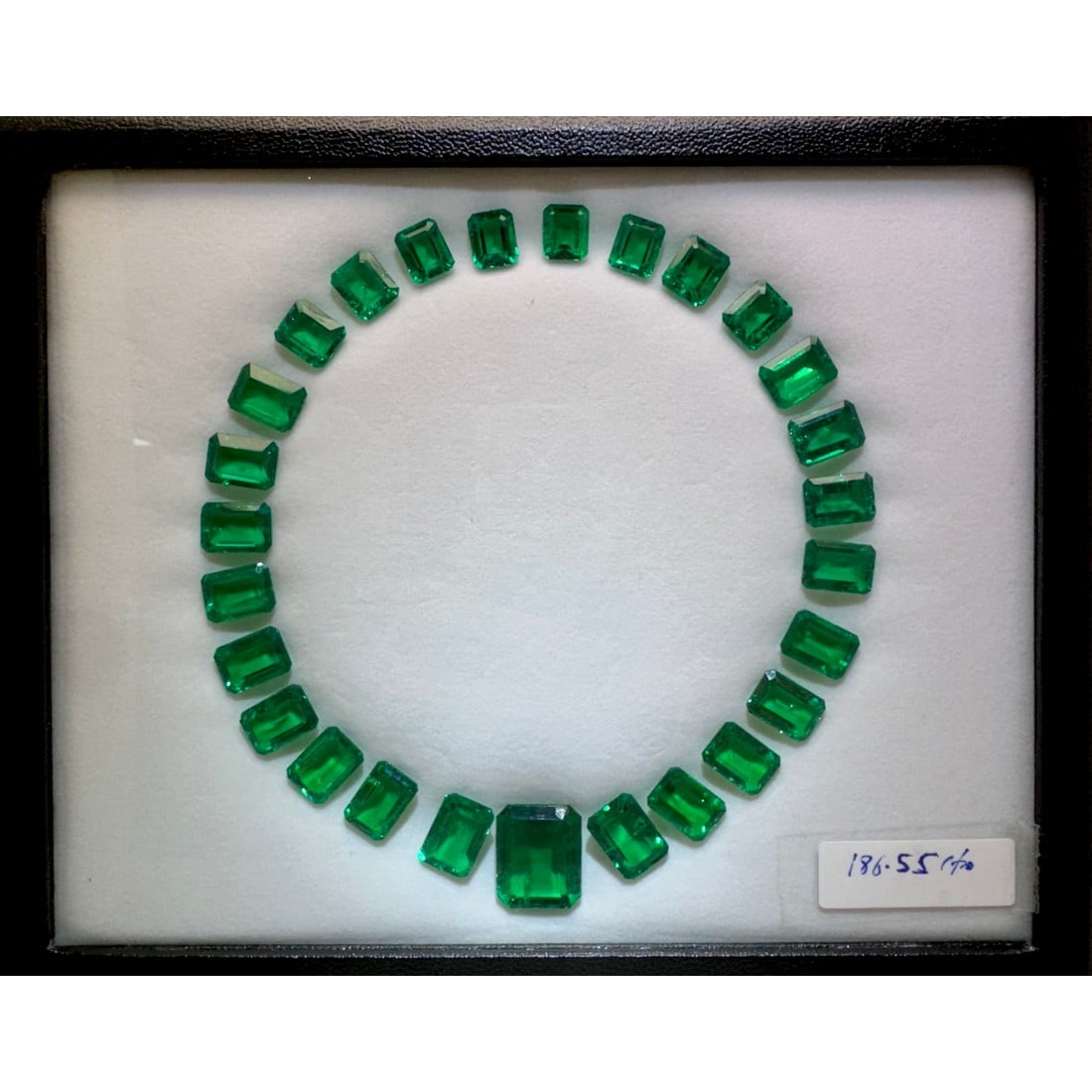 Set of 27 Lab Grown Columbian Emerald Layout: Gemstone Type: Columbian Emerald (Lab Grown) Cut Shape: Emerald Measurement (Appro.): 9x11mm ~ 17x20mm Total no. of Lab Gemstones: 27 Total Carat Weight (Appro): 186.55 This labgrown gemston