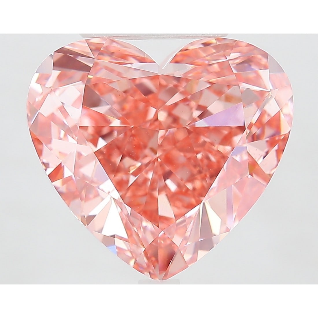 10.41 ct, Fancy Vivid Pink/VS1, Heart cut IGI Graded Diamond: Click here to view HD 360 Spinning Image Click here to view Certificate Report IGI Gra