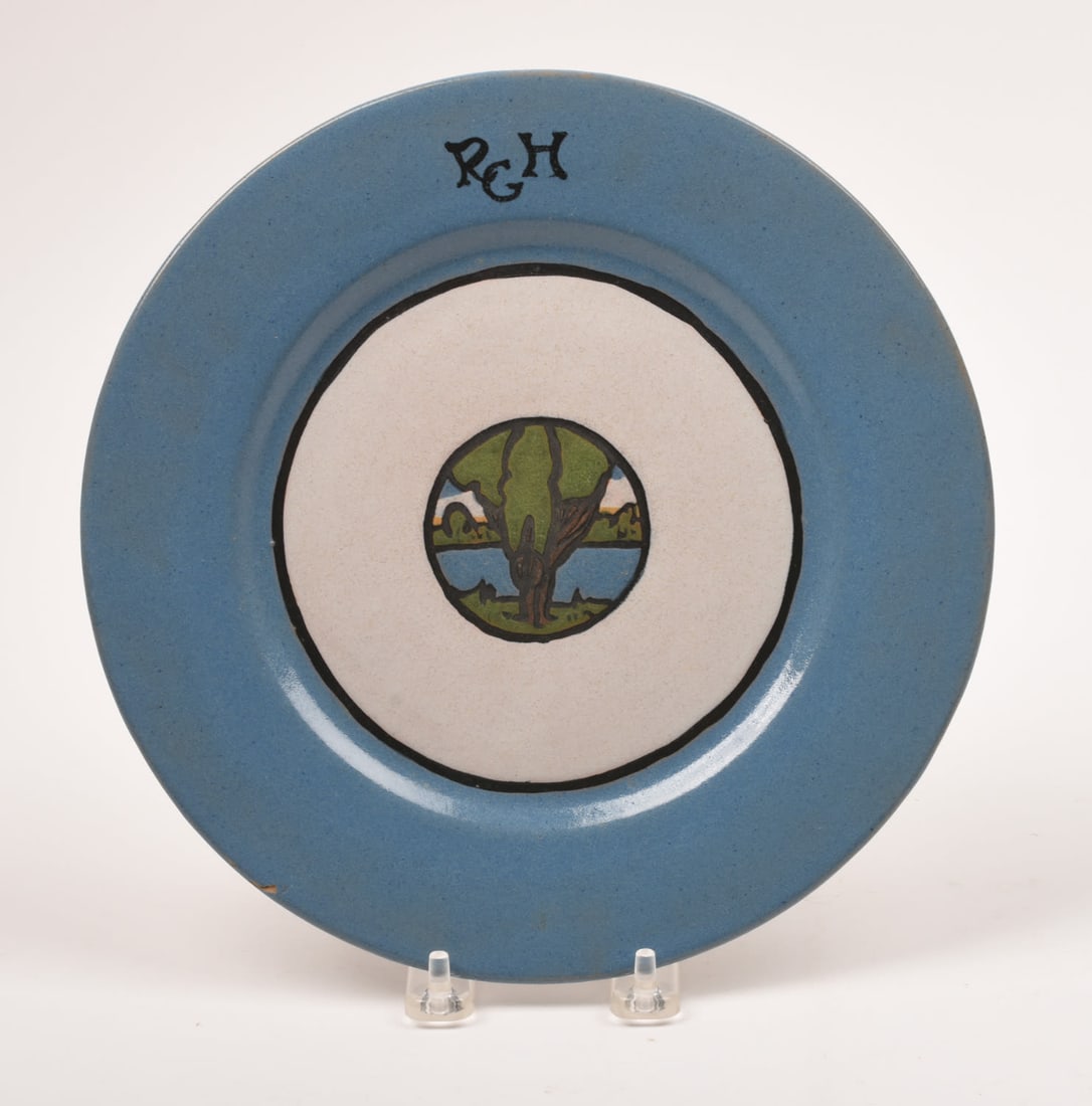Saturday Evening Girls Dinner Plate: with Landscape Medallion. 5/8 inches high, 9 5/8 inches diameter. Sara Galner, S.E.G. / 9-21 / artist's cipher.