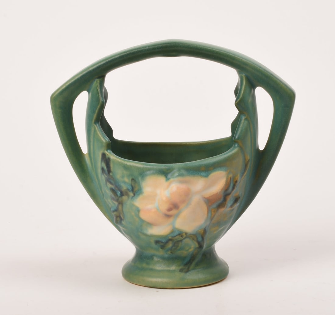 Roseville Pottery Green Magnolia Basket: 7 1/4 inches high, 7 1/4 inches wide, 4 3/8 inches deep, marked Roseville USA 383-7