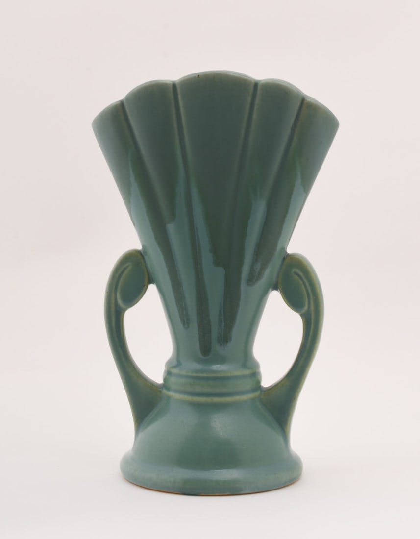 Roseville Pottery Blue Carnelian I Vase: 8 1/8 inches high, 4 1/2 inches wide, 3 3/4 inches deep, blue inkstamp