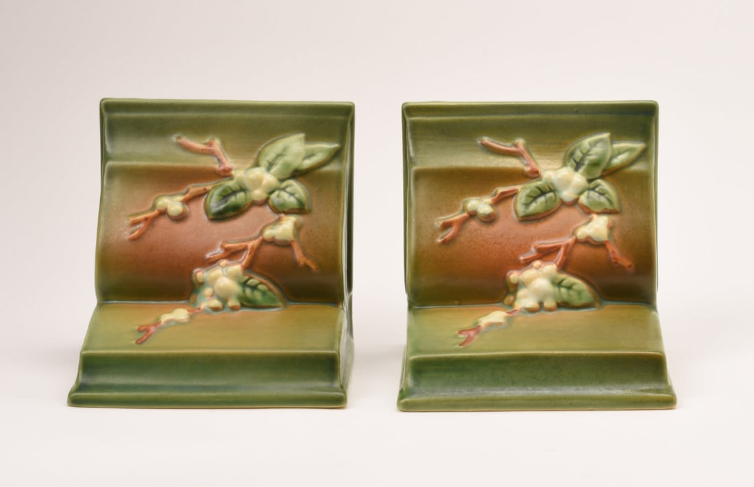 Roseville Pottery Pair of Green Snowberry Bookends: 13 1/4 inches high, 8 inches wide, 5 1/4 inches deep, marked Roseville U.S.A. IBK-10