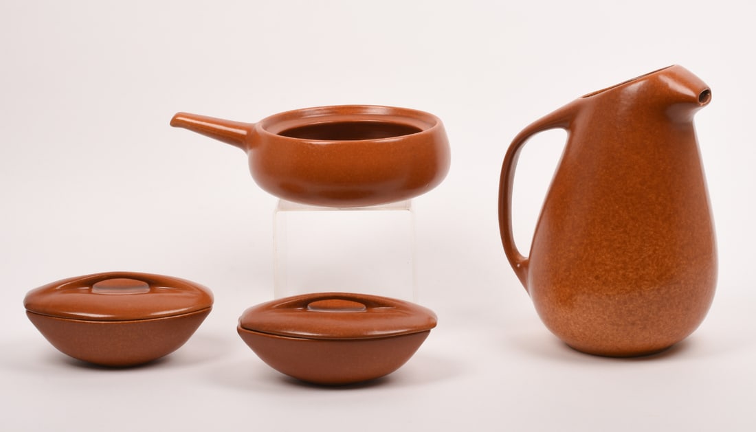 Group of Roseville Raymor Terra Cotta Tablewares.: one #189 water pitcher, one #198 casserole, two #156 ramekins, all marked Roseville Raymor USA