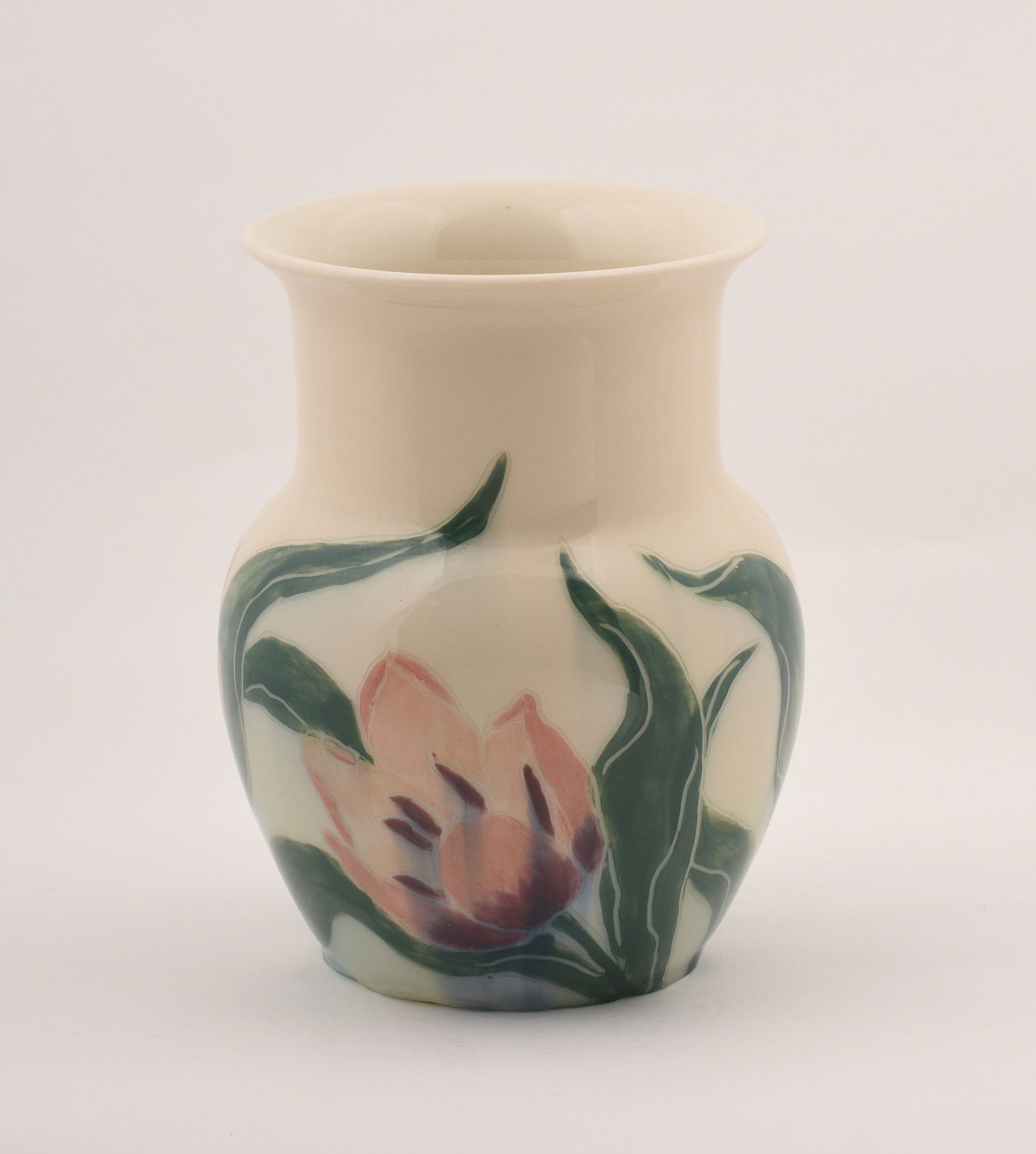 Rookwood Pottery Jewel Porcelain Vase: decorated with flowers. E.T Hurley, 1944. 6 1/4 inches high, 5 inches diameter. Impressed Rookwood Pottery Flame mark, XLIV/6315/artist's cipher.