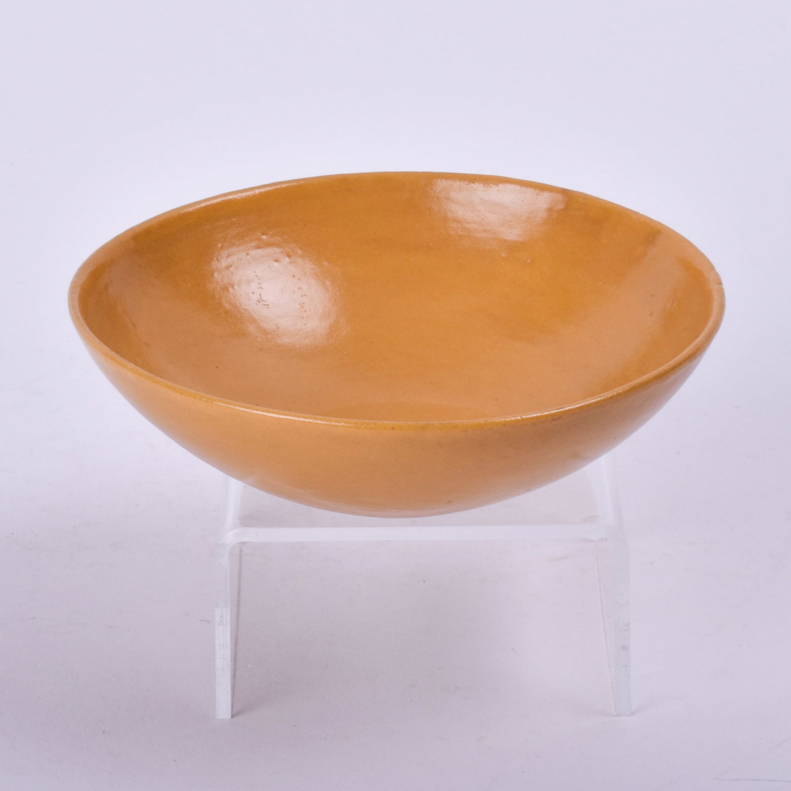 Saturday Evening Girls (Paul Revere Pottery) Bowl: with a yellow glaze. 1 3/8 inch high, 4 7/8 inches diameter, marked PRP black inkstamp.