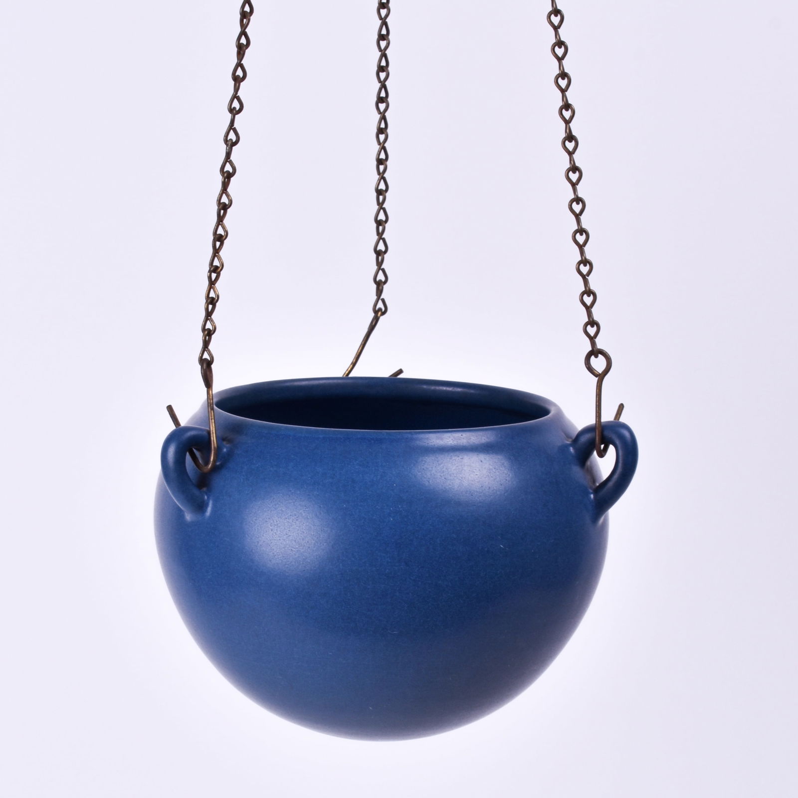 Marblehead Pottery Hanging Basket: covered in a matte blue glaze. 4 5/8 inch high, 6 3/4 inches wide, 6 3/8 inches deep, unmarked.
