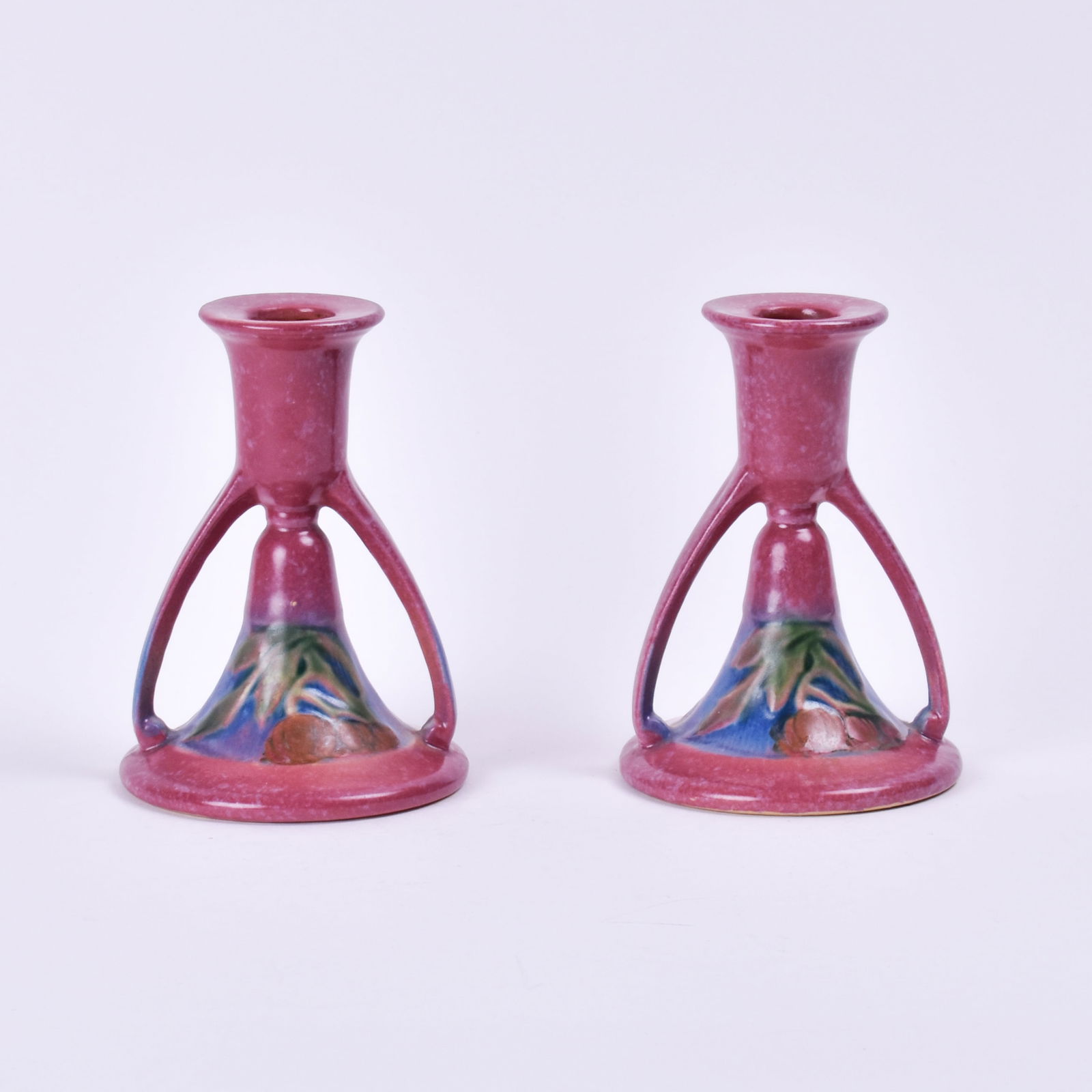 Pair Roseville Pottery Pink Baneda Candlesticks: 5 1/8 inches high, 3 7/8 inches diameter, unmarked, 1087-5