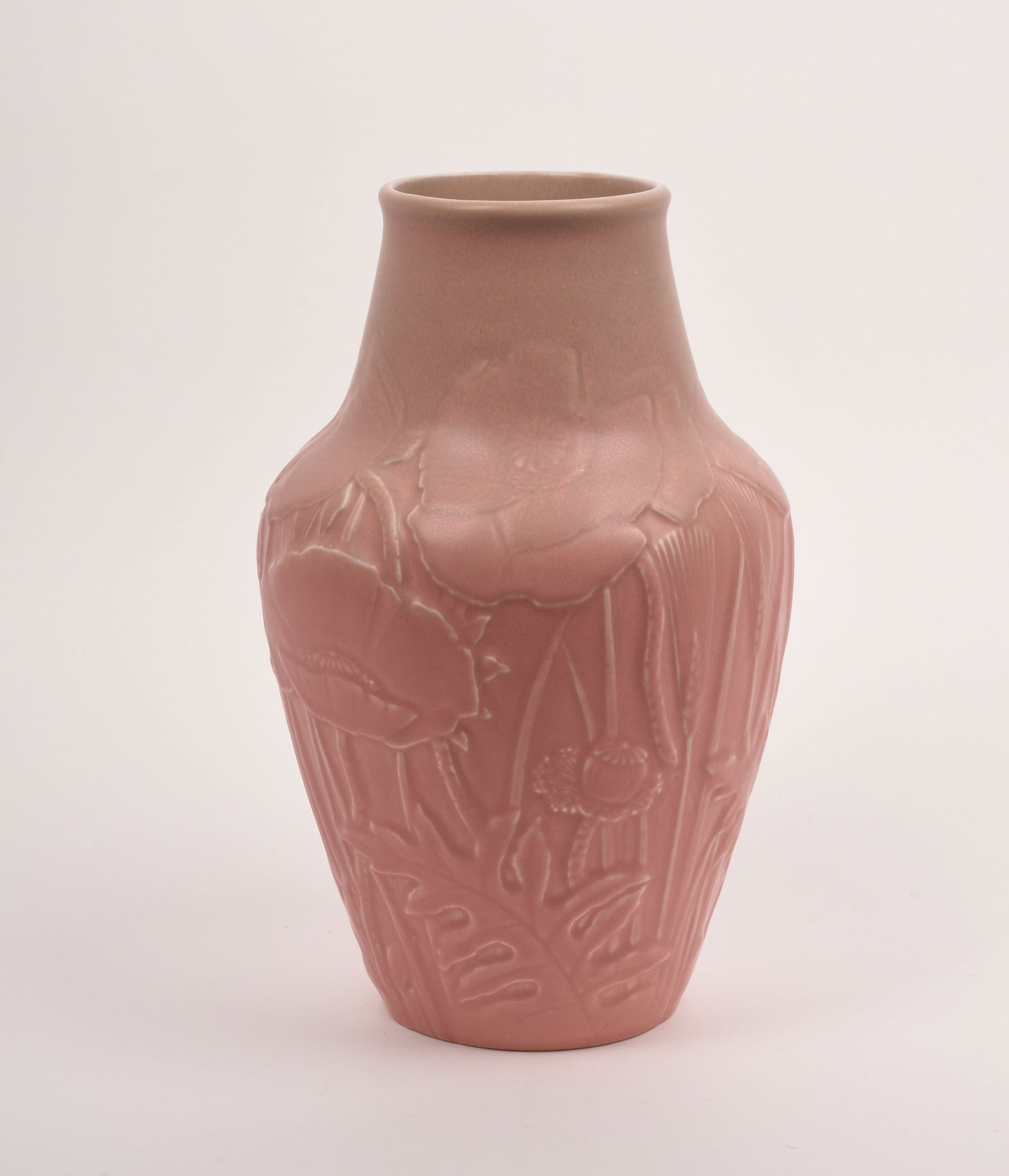 Rookwood Pottery Production Vase: with embossed flowers covered in a matte pink glaze. 1928. 11 3/4 inch high, 7 5/8 inches diameter. Impressed Rookwood Pottery Flame mark, XXVIII/6006.
