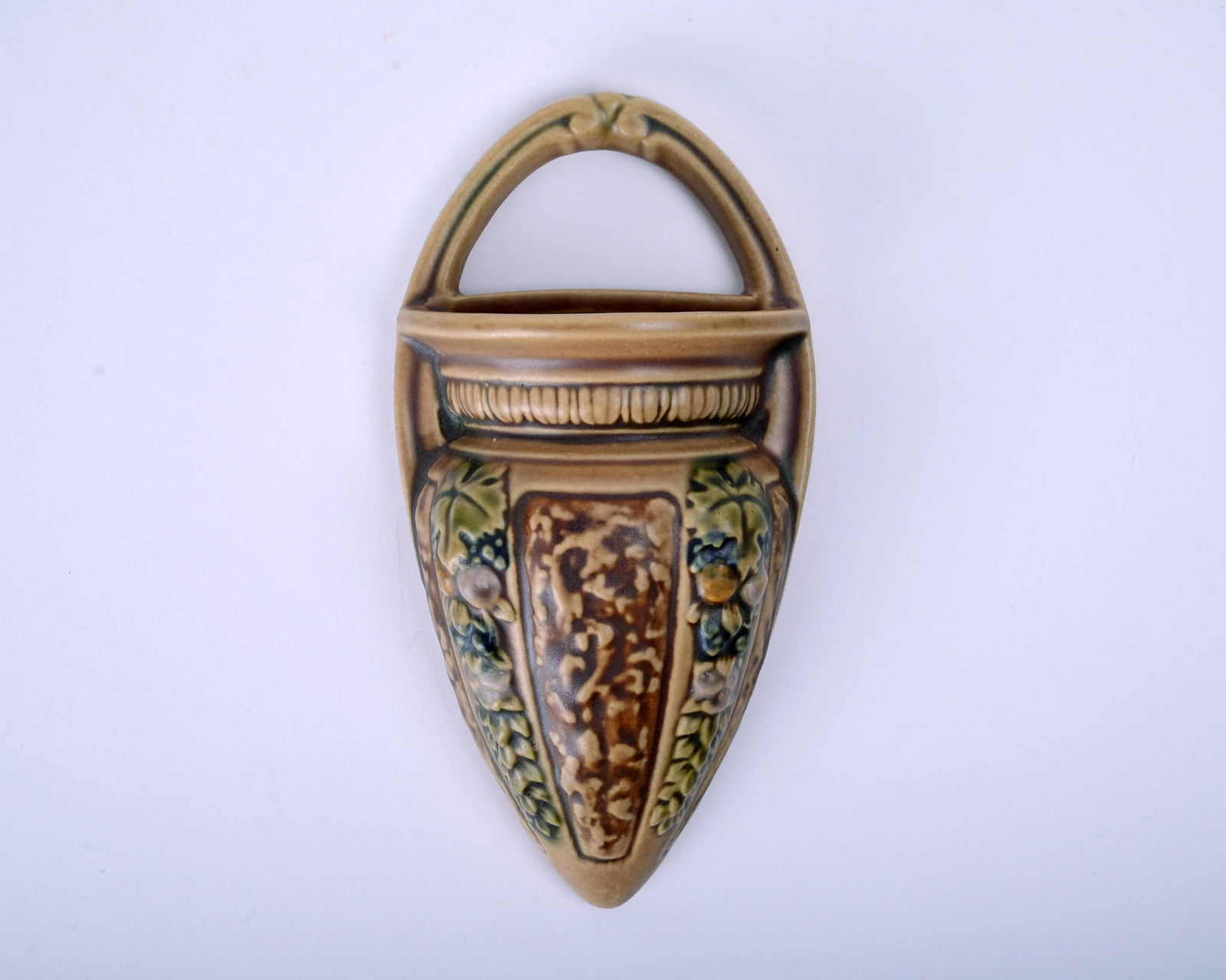 Roseville Pottery Florentine I Wallpocket: 8 1/2 inches high , 4 1/4 inches wide, 2 1/4" deep, unmarked, 1238/8.