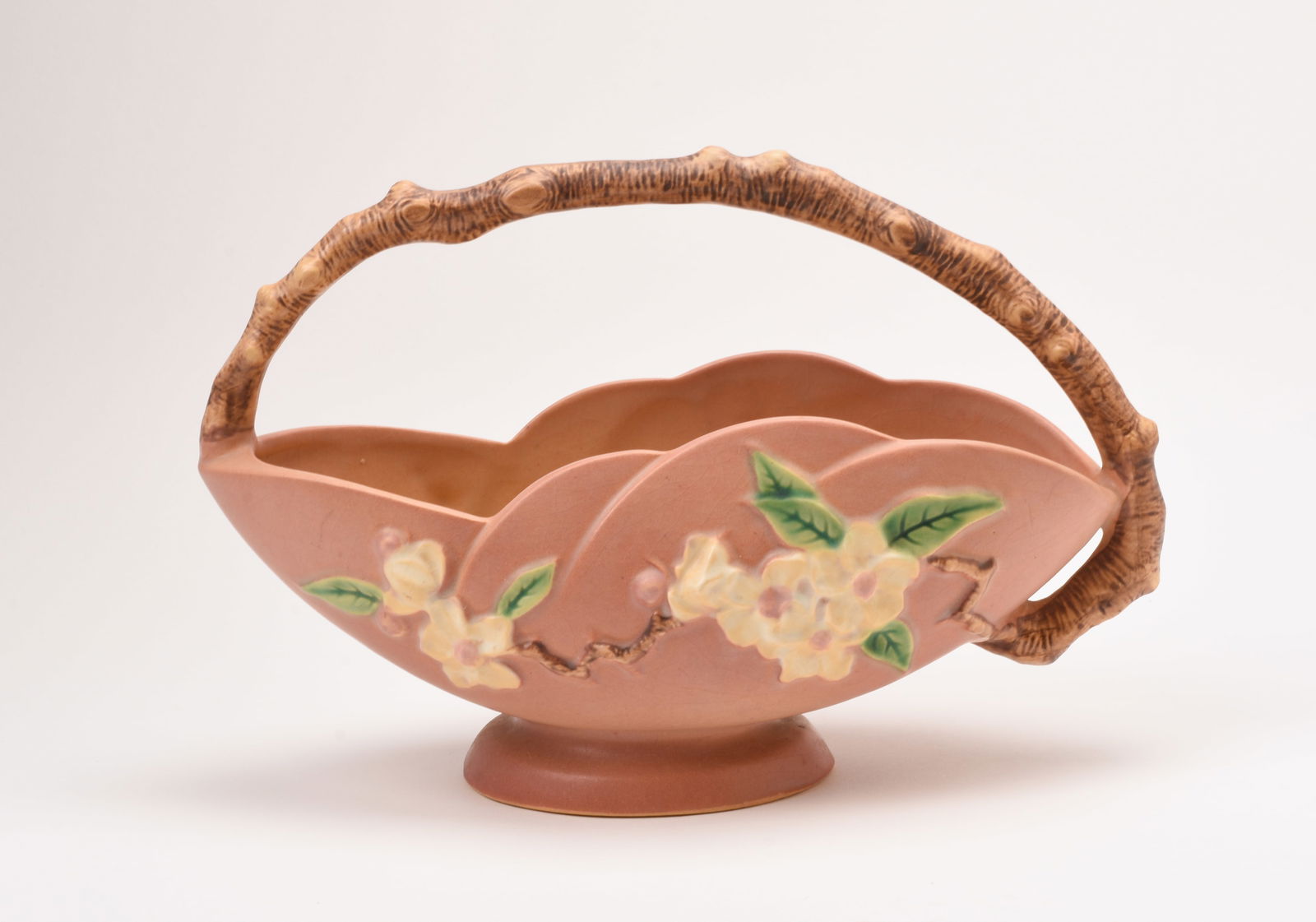 Roseville Pottery Pink Apple Blossom Basket: 7 3/4 inches high, 11 5/8 inches wide, 5 1/8 inches deep, marked Roseville U.S.A. 310-10
