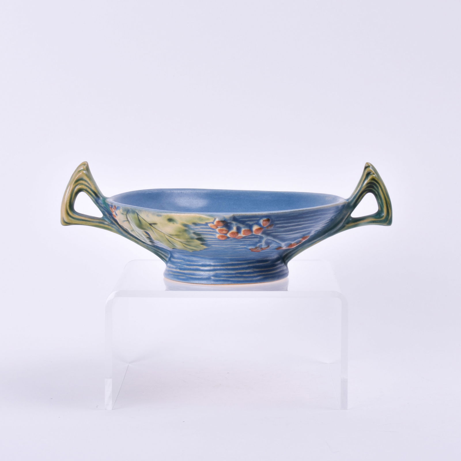 Roseville Pottery Blue Bushberry Bowl: 3 inches high, 8 3/4 inches wide, 6 1/2 inches deep, marked Roseville U.S.A 412-6.