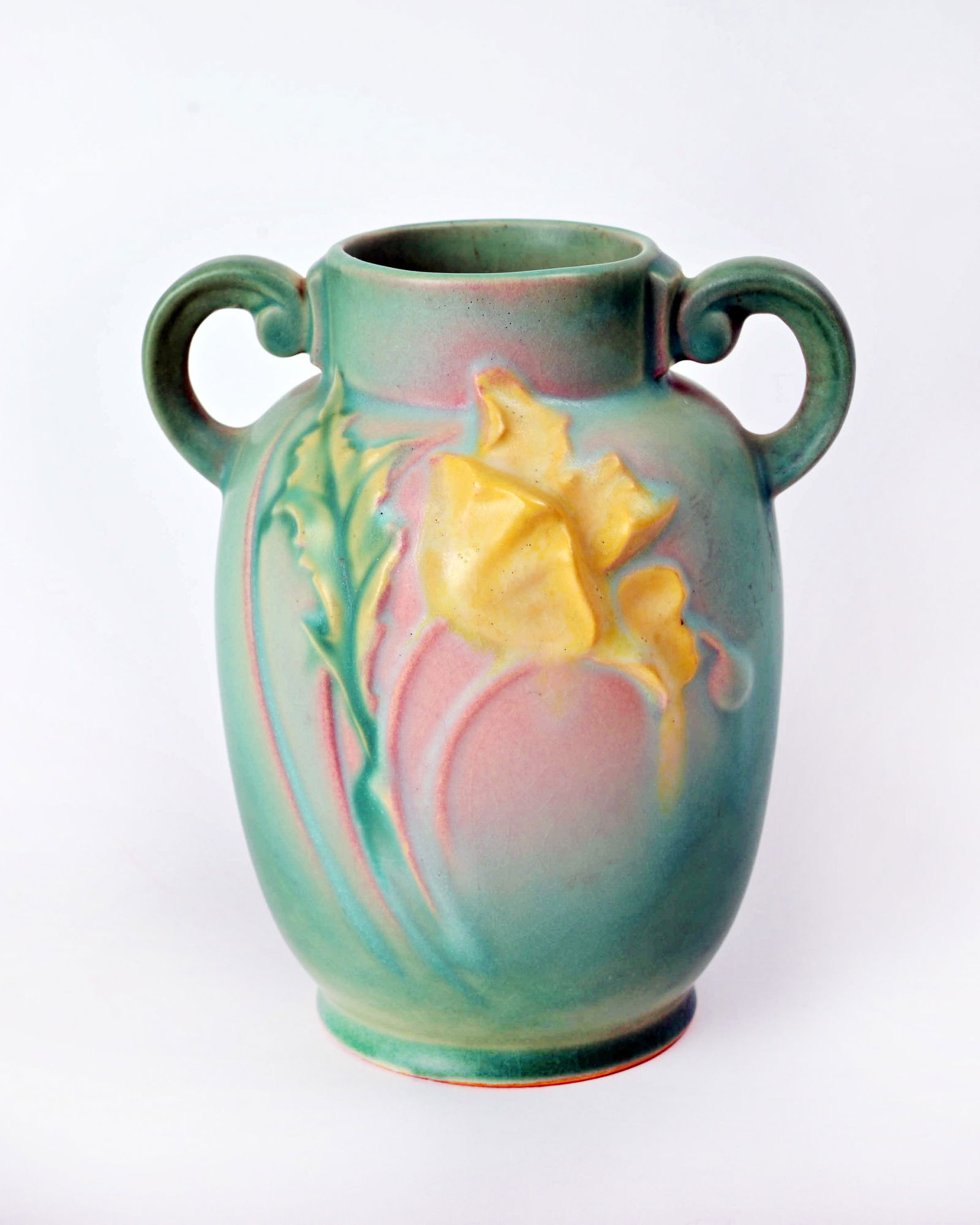 Roseville Pottery Green Poppy Vase: 6 inches high, 5 3/8 inches wide, 4 1/2 inches deep, marked Roseville 867-6.