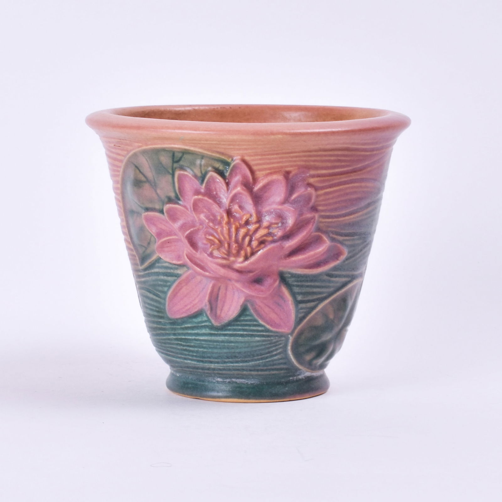Roseville Pottery Pink Water Lily Flower Pot: 5 1/8 inches high, 6 1/8 inches diameter, marked Roseville U.S.A 664-5.