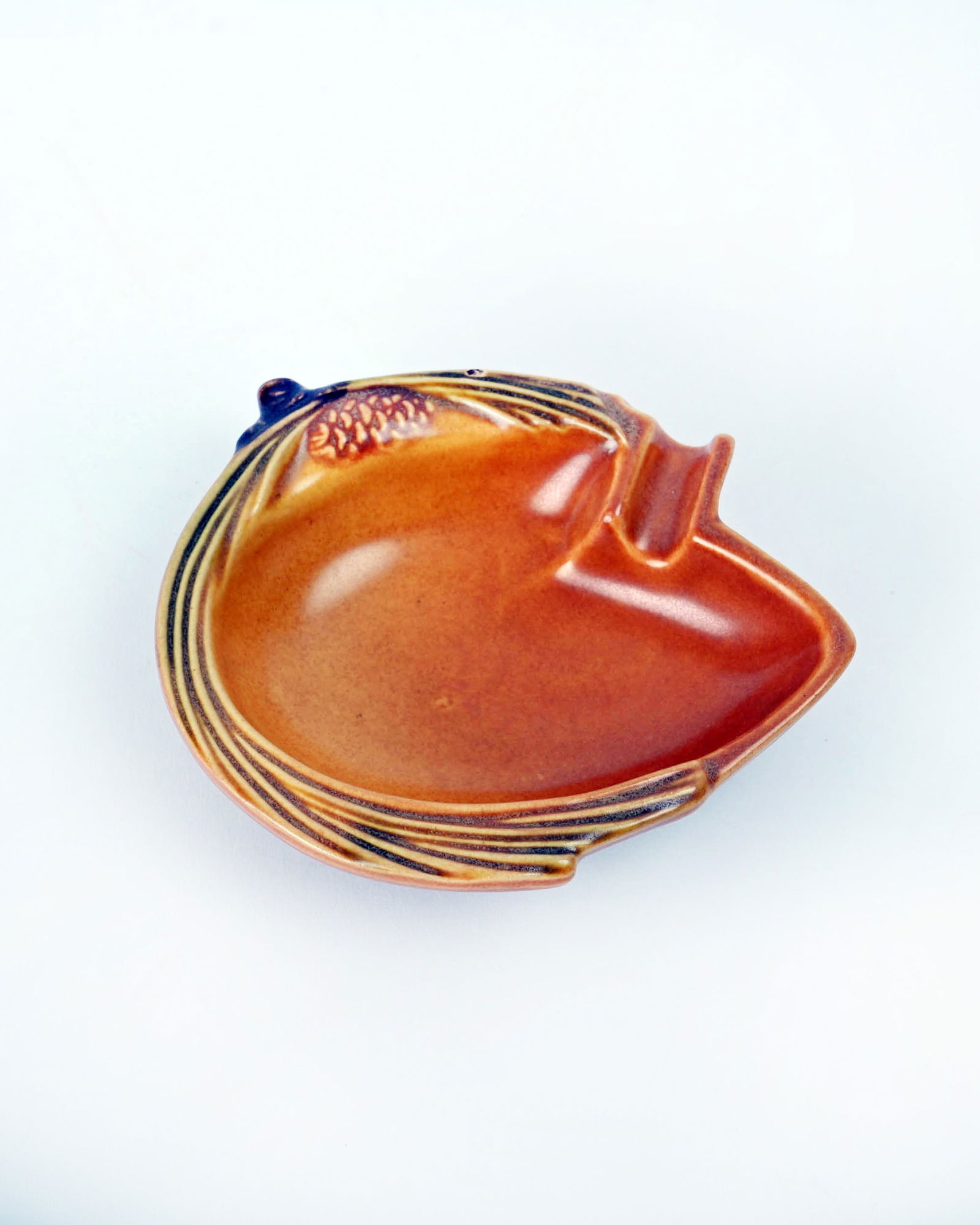 Roseville Pottery Brown Pine Cone Ashtray: 1 1/4 inches high, 4 3/4 inches wide, 4 1/8 inches deep, marked Roseville U.S.A 499.