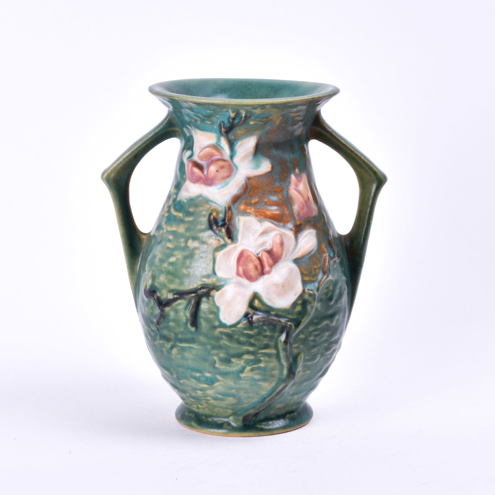 Roseville Pottery Green Magnolia Vase: 7 1/8 inches high, 6 inches wide, 4 3/4 inches deep, marked Roseville U.S.A 90-7.