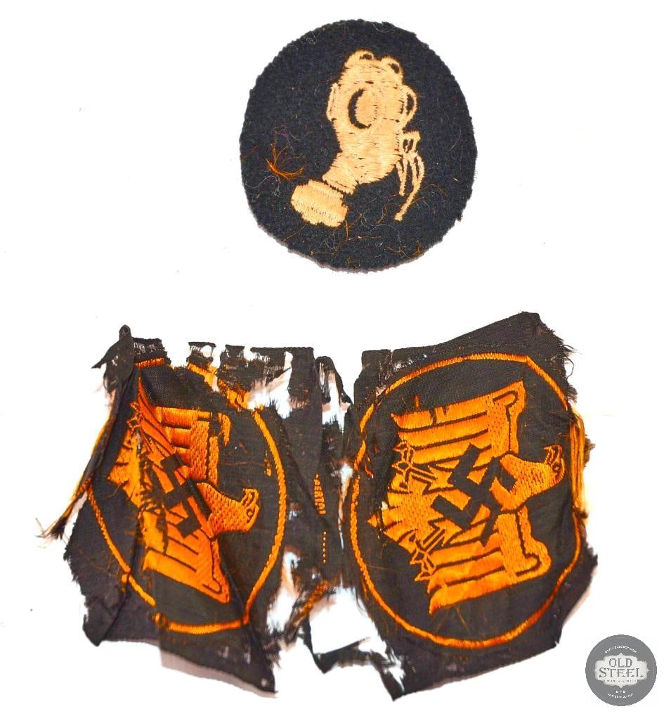 WWII German Waffen SS Gas Protection NCO Specialist Patch and Bronze NSRL Sports Vest Badge: This lot contains 2 patches. One patch is a WWII German Waffen SS gas protection NCO specialist sleeve patch. The other is a German NSRI bronze sports badge. This has fraying present. 