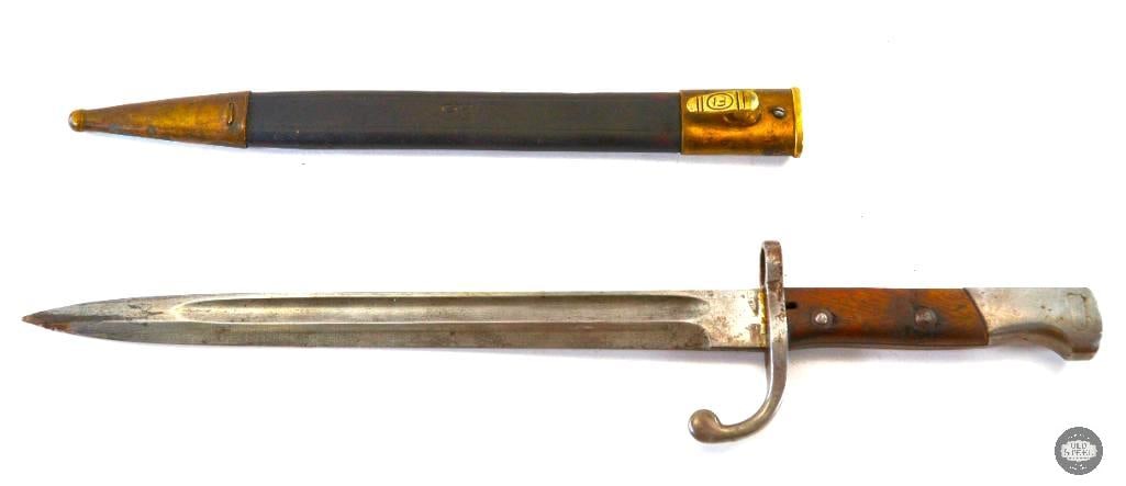Brazilian M1908: Brazilian M1908 bayonet for use with the 7 mm M1908 Mauser rifle produced for Brazil by DWM. Leather scabbard with FI on the hanger. "FI" is an abbreviation for Fabrica de Itajuba, the Brazi