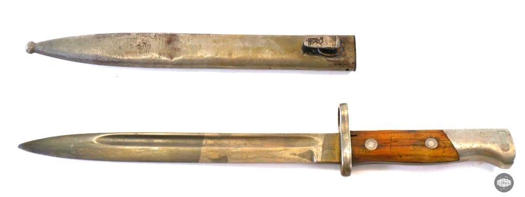 Spanish M1936 Bayonet with Scabbard for Spanish Mauser: Spanish M1936 Bayonet with Scabbard for Spanish Mauser rifle. 15" overall with a 9 1/2" blade. Lightly sharpened blade. Ricasso marked with "crown/FNT" arsenal mark on one side and S/N:74/D on the oth