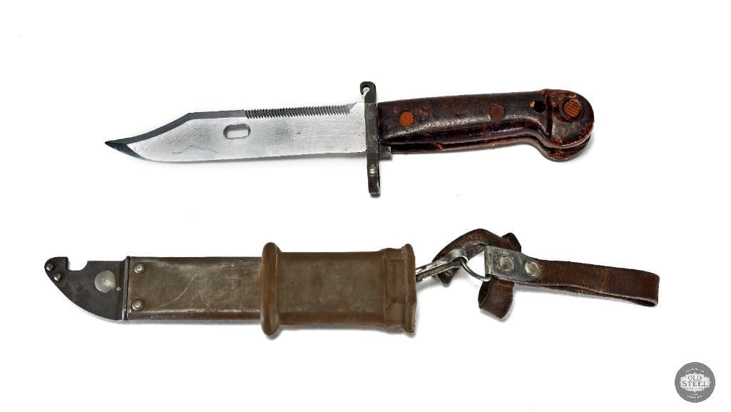 Romanian AKM Type I Bayonet with Scabbard: Up for auction is a Romanian Type I AKM bayonet with its scabbard. A Russian style leather belt hanger is attached. Great condition, bid today! THIS I