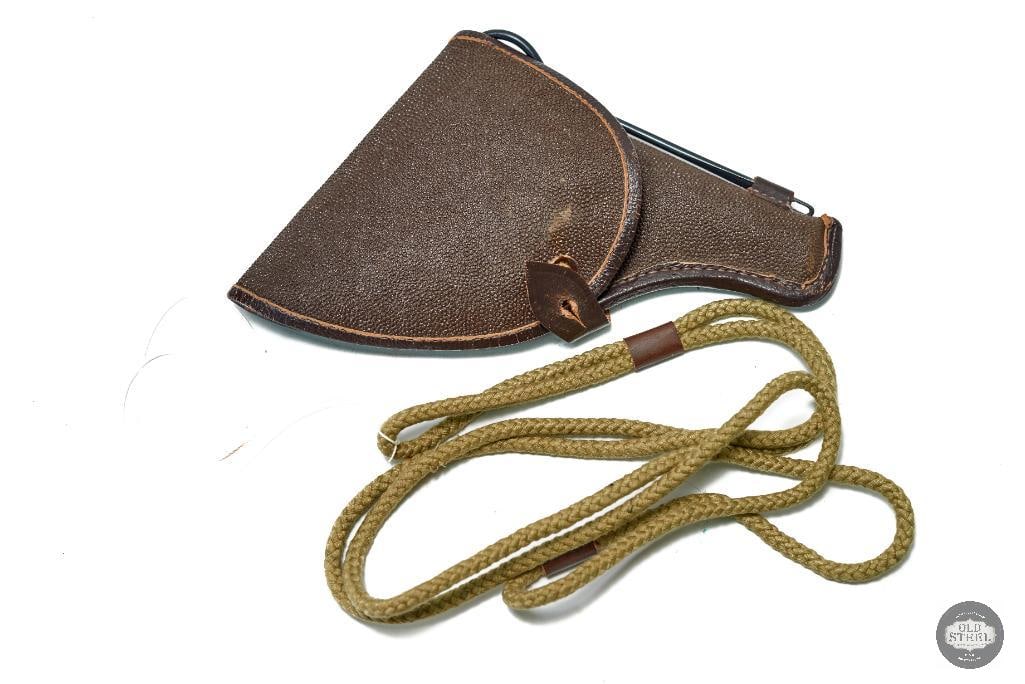 Soviet M1895 Nagant Revolver Holster - Cleaning Rod and Lanyard: For this lot we have an M1895 Nagant revolver holster with a cleaning rod and lanyard rope. The holster is in great condition. The stamp on the inside of the flap is difficult to read. 