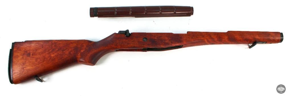 US M14 Rifle Stock: Offered is a US M14 rifle stock and handguard in excellent condition. Installed on the stock is the selector switch and the metal flip up buttplate. 