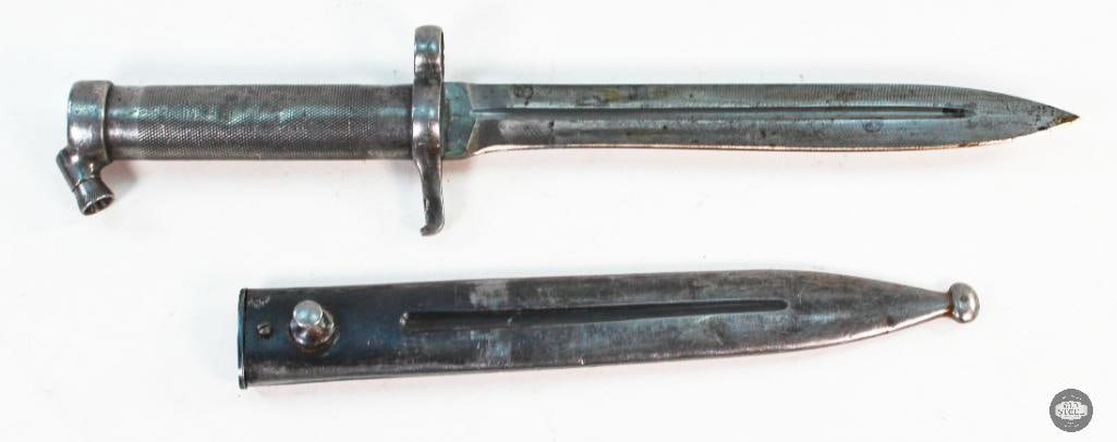 Swedish M1896 Mauser Bayonet and Scabbard: For this lot we have a Swedish M1896 Mauser bayonet with an unmatched scabbard. The finish is worn and the knurling softened. The blade has a sharp edge. Markings on teh ricasso, scabbard and guard ar