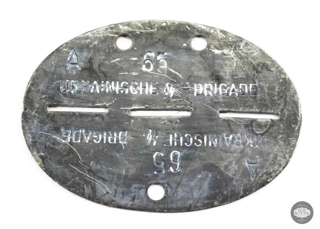 SS Soldier's Dogtag - WWII German: A German SS soldiers dogtag from WWII. THIS ITEM IS AS PICTURED WITH NO FURTHER ATTACHMENTS. ALL SALES ARE FINAL. PLEASE REFER TO THE AUCTION DE