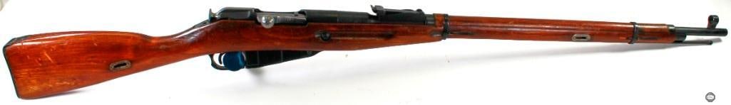 Russian Mosin-Nagant Rifle M91/30: This lot contains a Russian Mosin-Nagant M91/30 rifle with mostly matching serial numbers, with the exception being the buttplate serial. The rifle's action cycles smoothly, and the manual s