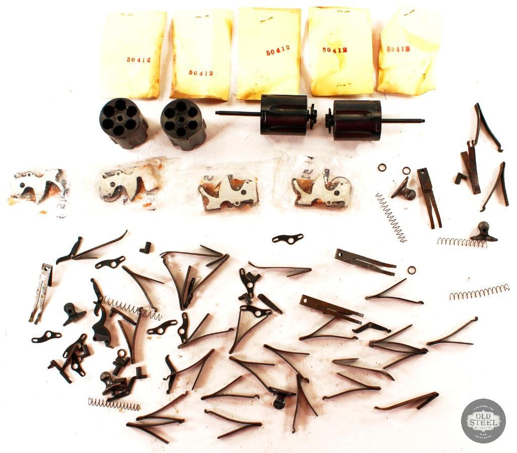 Various Colt Revolver Parts: Up for auction is a series of assorted Colt revolver parts including hammers, cylinders and springs. The cylinders are not marked but the chambers measure .32 caliber at the front. 