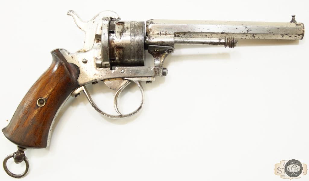 Lefaucheux Pinfire Revolver "The Guardian": Here we have a Lefaucheux Pinfire Revolver dubbed "The Guardian". The action cycles very well and is easy to operate. The handgun does show it age with its generalized wear, but the grips remain chip 